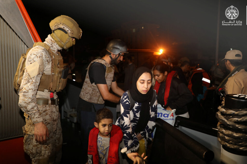 Saudi citizens and other nationals are evacuated through Saudi Navy Ship from Sudan to escape the conflicts, Port Sudan, Sudan, April 22, 2023. Saudi Ministry of Defense/Handout via REUTERS