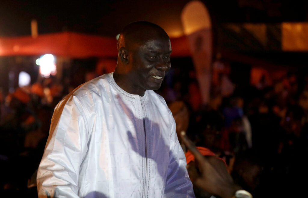 Idrissa Seck, a presidential candidate of the coalition "Idy 2019", greets his supporters during a campaign rally in Thies, Senegal. REUTERS/Zohra Bensemra