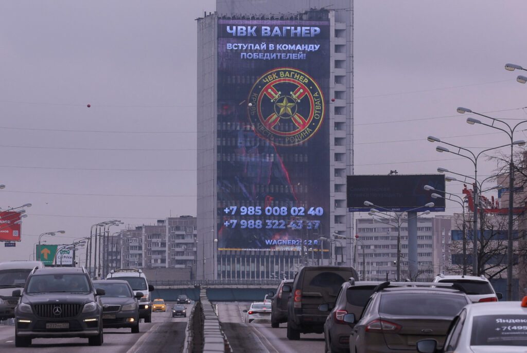 An advertising screen, which promotes to join Wagner private mercenary group, is on display on the facade of a building in Moscow, Russia. REUTERS/Evgenia Novozhenina