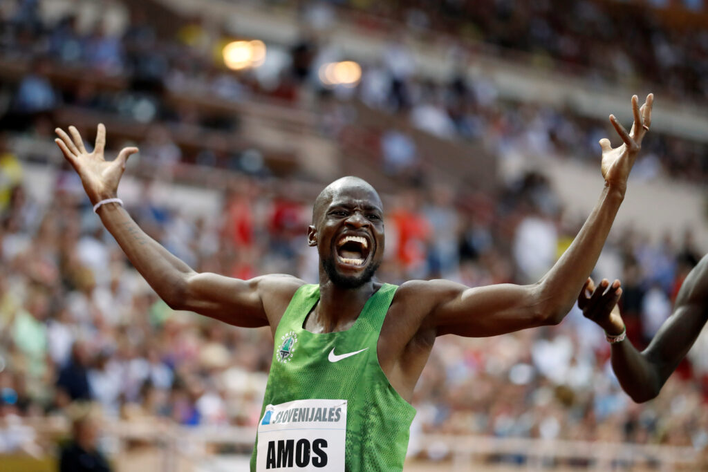 Botswana's Nijel Amos celebrates after winning the Men's 800m. REUTERS/Eric Gaillard