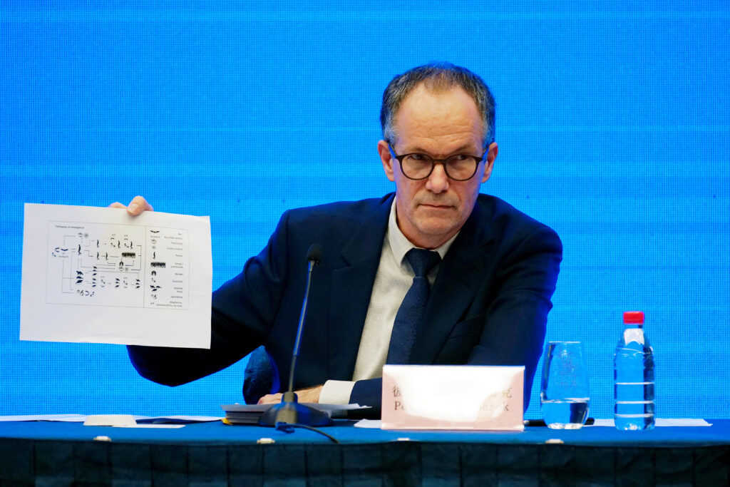 Peter Ben Embarek, a member of the World Health Organization (WHO) team tasked with investigating the origins of the coronavirus disease (Covid-19), holds a chart during the WHO-China joint study news conference at a hotel in Wuhan, Hubei province, China. REUTERS/Aly Song