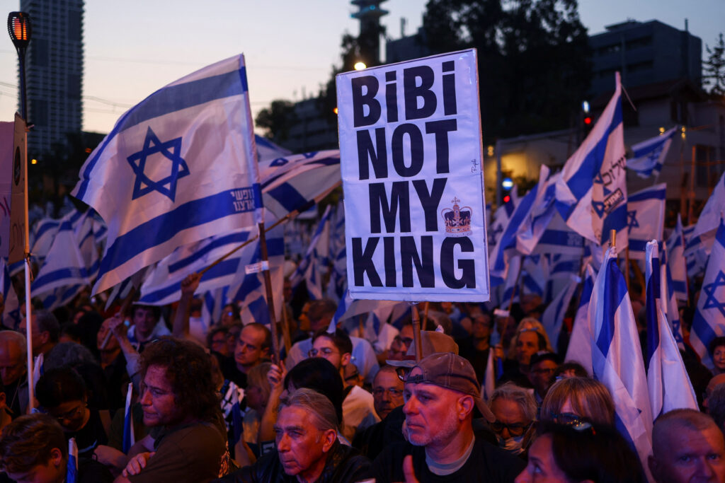 People take part in a demonstration against Israeli Prime Minister Benjamin Netanyahu and his nationalist coalition government's judicial overhaul, in Tel Aviv, Israel. REUTERS/Ronen Zvulun