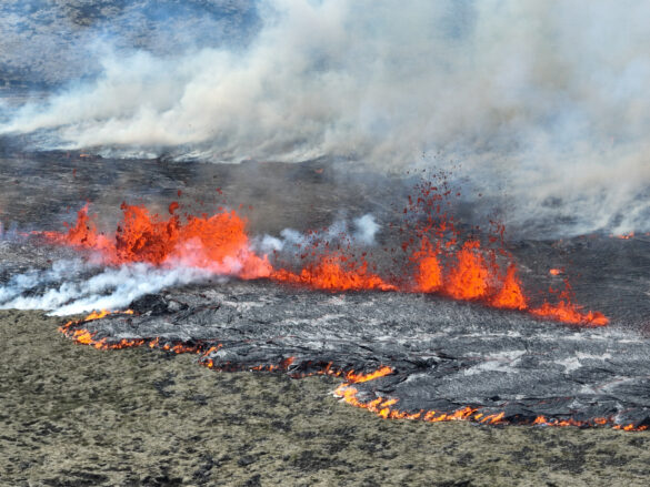 Smoke billows and lava spurts after the eruption of a volcano, on the Reykjanes peninsula, near the capital Reykjavik, in southwest Iceland, July 10, 2023, in this picture obtained from social media. Juergen Merz - Glacier Photo Artist/via REUTERS