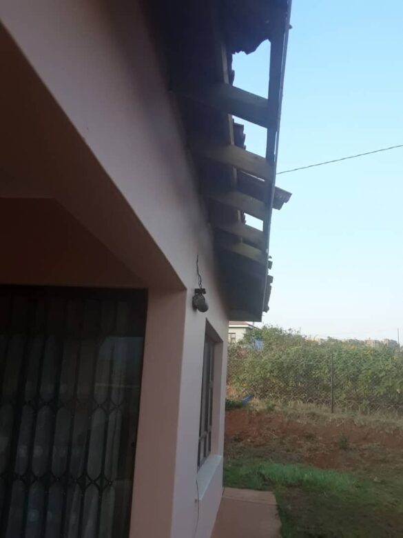 A portion of the roof where the tiles fell off