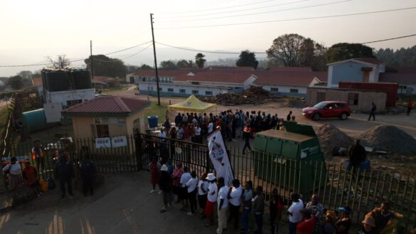 People queuing to vote